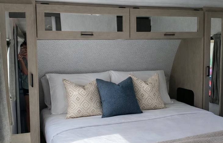 Master has a custom queen versa tilt bed with brand new mattress, side storage units and a spacious closet.