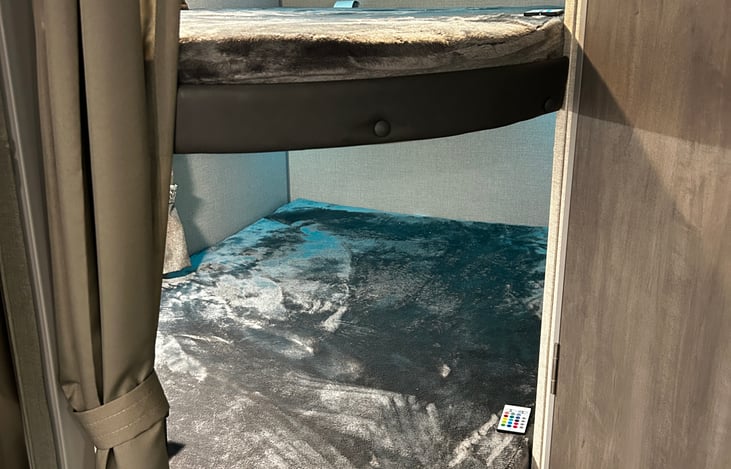 Double-sized bunks fit 4 people.  Kids LOVE them!  They have color-changing LED lights and a curtain for privacy.