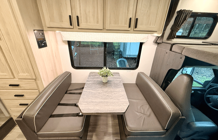 Convertible dinette that turns into a double bed.