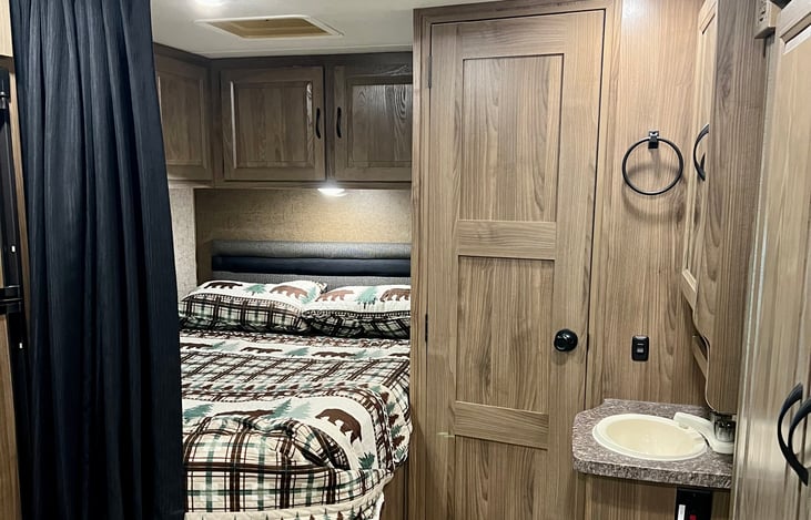 Master bedroom with privacy curtain