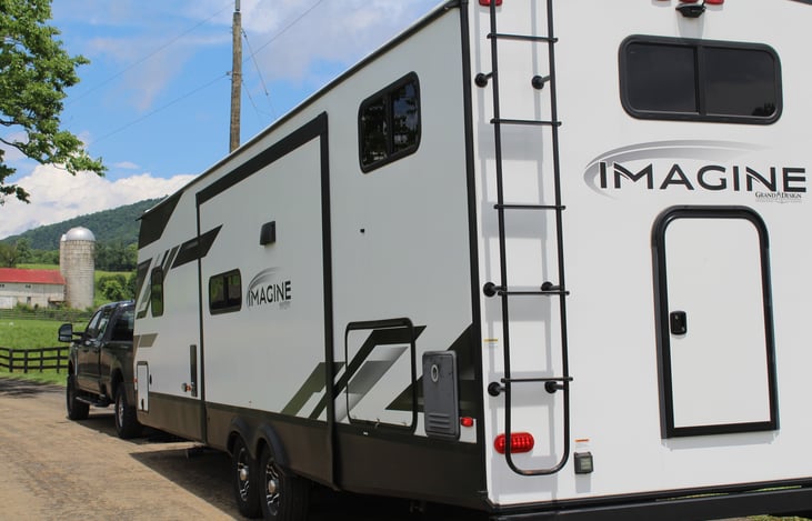Imagine towing this beautiful RV, or having it delivered into your favorite countryside view!