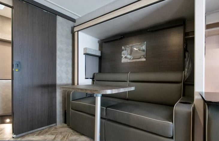 Murphy bed concealed. Open floor space.