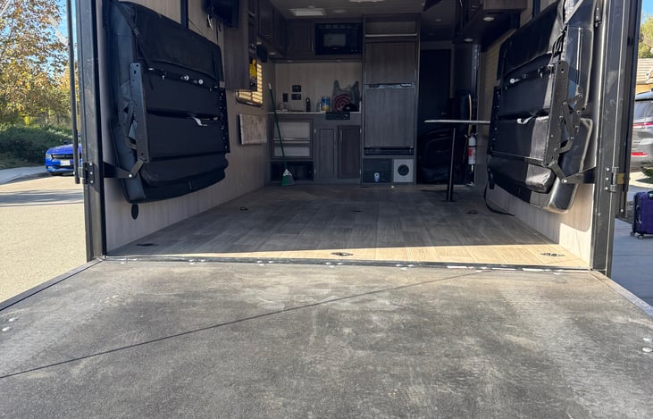 Rear View with opened garage door