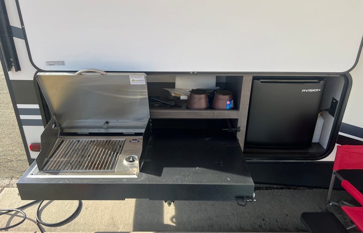 Outdoor Kitchen Includes:
Gas Grill, Grilling tools, Refrigerator,