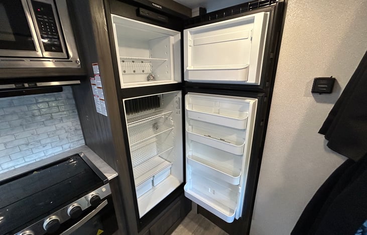 This large fridge / freezer is great for storing enough food for longer trips.