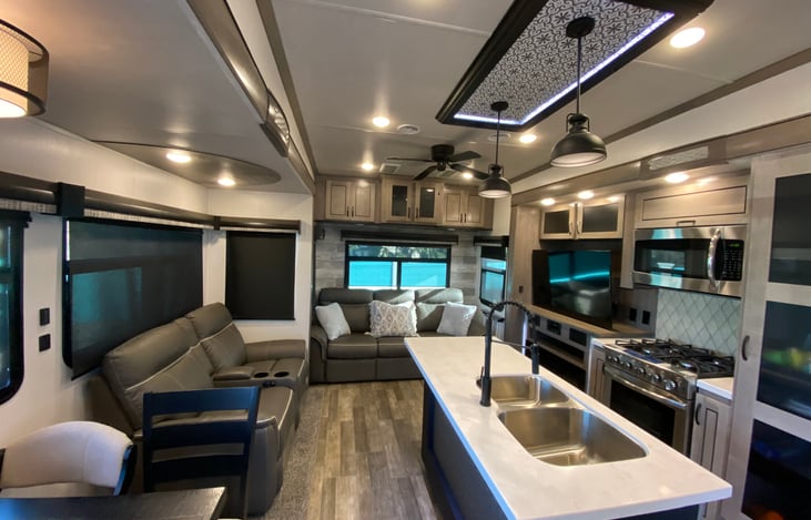 Kitchen and living area - two electric recliners and a pull out couch