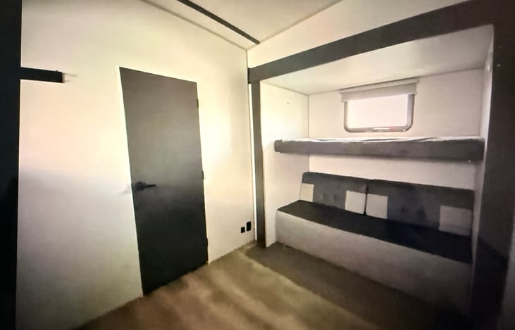 Bunkhouse with queen pull-out and two bunk beds.