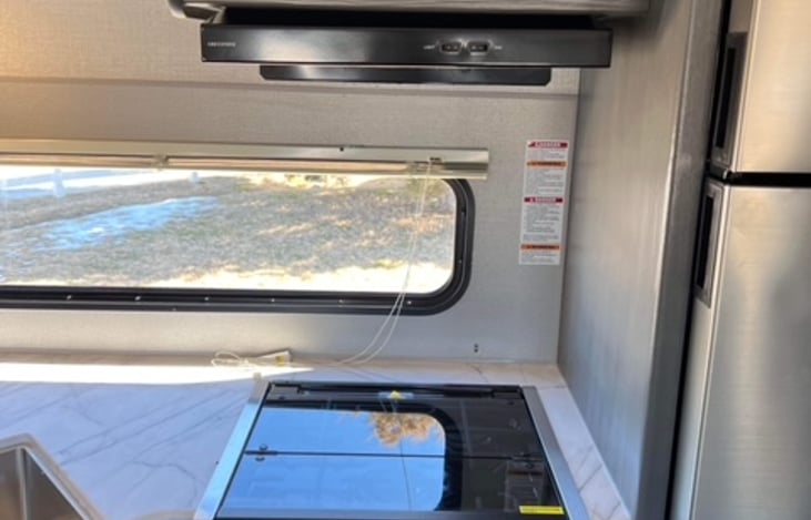 Gas range and microwave