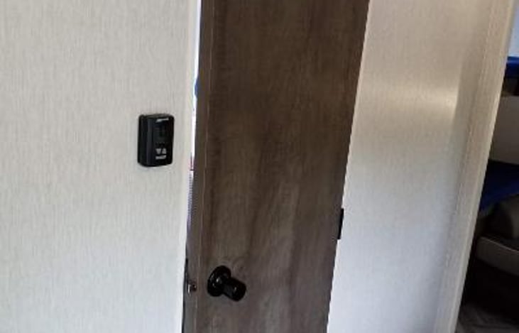 EXTERIOR OF BATHROOM DOOR.
