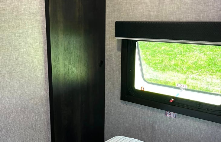 Main bedroom with door closed creates completely private space.