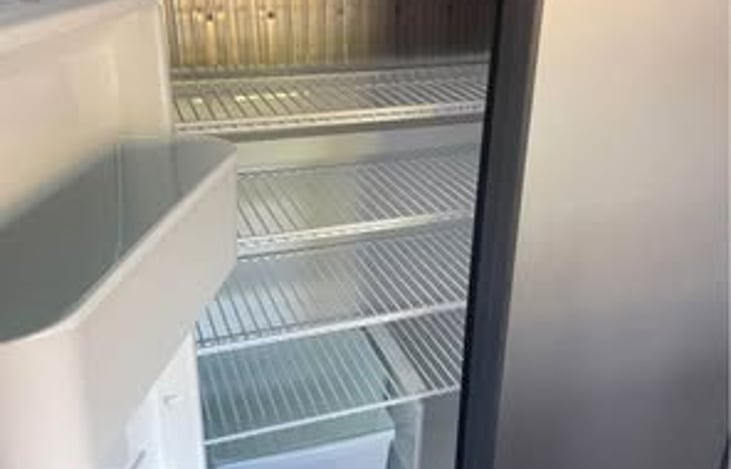 Inside full size refrigerator.