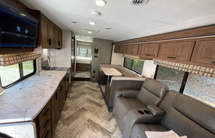 Tons of counter space and overheard storage. Fully loaded with everything you need to cook and clean!