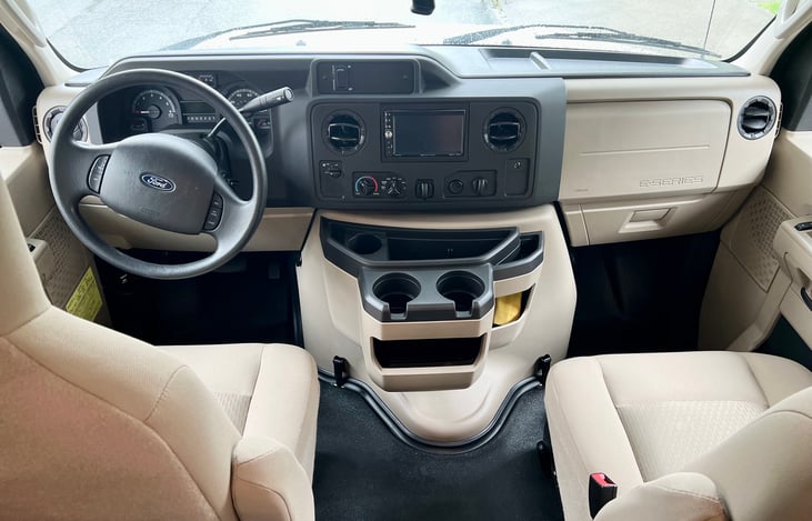 Comfortable air conditioned cab with plenty of road snack storage