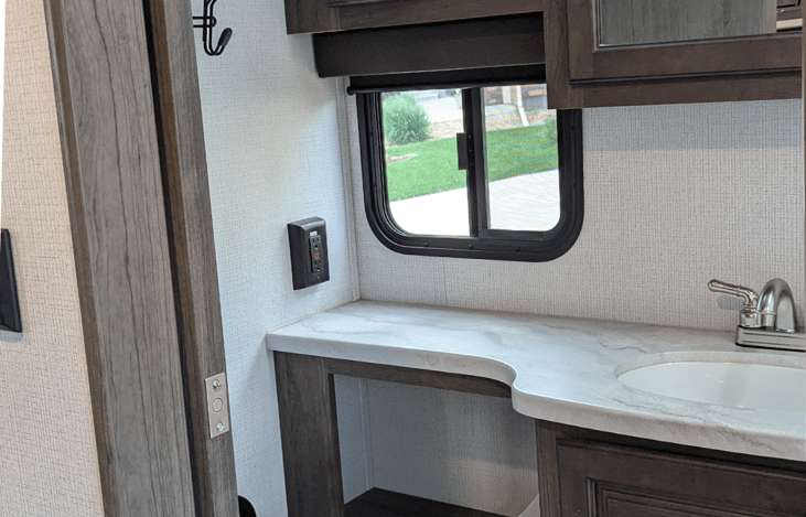 High Ceiling bathroom equipped with ventilation fan