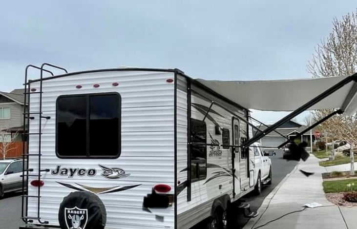 Awning extended

(old owner was a Raiders fan and kept tire cover.. if it offends you, please don't hold it against me haha)