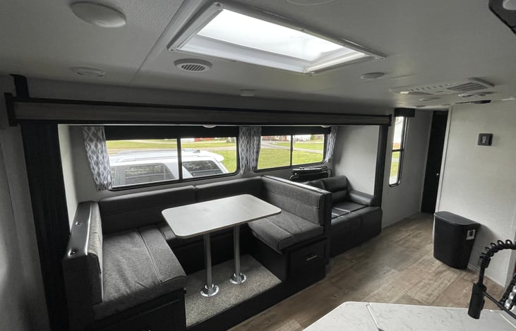 The table area converts to a bed and the couch also folds down to a bed.