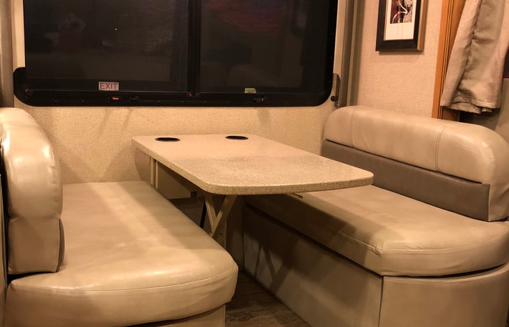 Dinette for 4. Please note: Cannot be used as a bed as table does NOT lower.