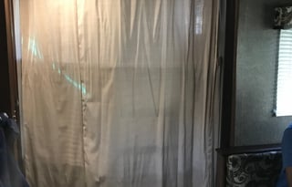 2018 Keystone Hideout, 26' long plus 3' hitch. Total: 29 Feet long.