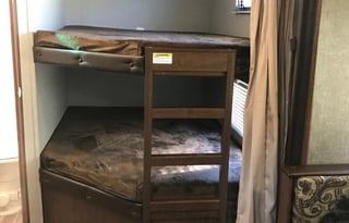 2018 Keystone Hideout, 26' long plus 3' hitch. Total: 29 Feet long.