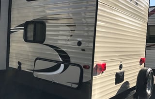 2018 Keystone Hideout, 26' long plus 3' hitch. Total: 29 Feet long.