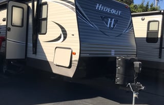 2018 Keystone Hideout, 26' long plus 3' hitch. Total: 29 Feet long.