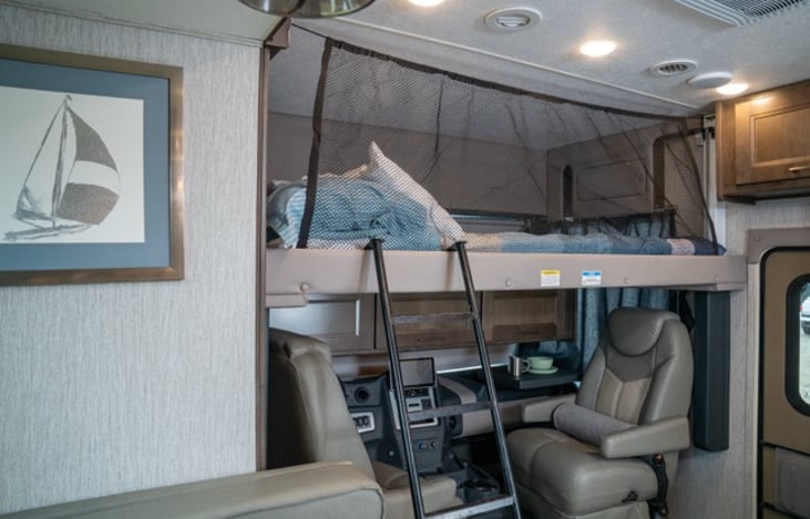 overcab bunk features a cargo net to keep little ones secure.