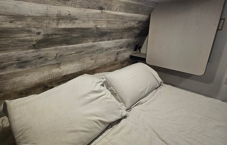 Dual outlets + USB ports on either side for easy device charging