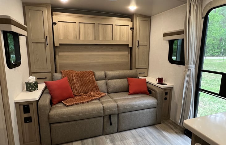 Sofa with reclining footrests