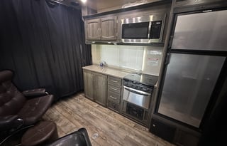 self-contained toy hauler on board fuel, generator