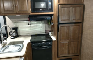 2017 with 2 sliders and outdoor kitchen