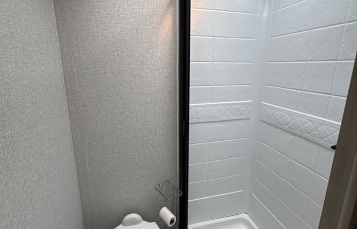 Indoor shower and toilet