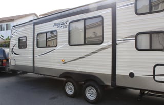 2018 Keystone Hideout, 26' long plus 3' hitch. Total: 29 Feet long.