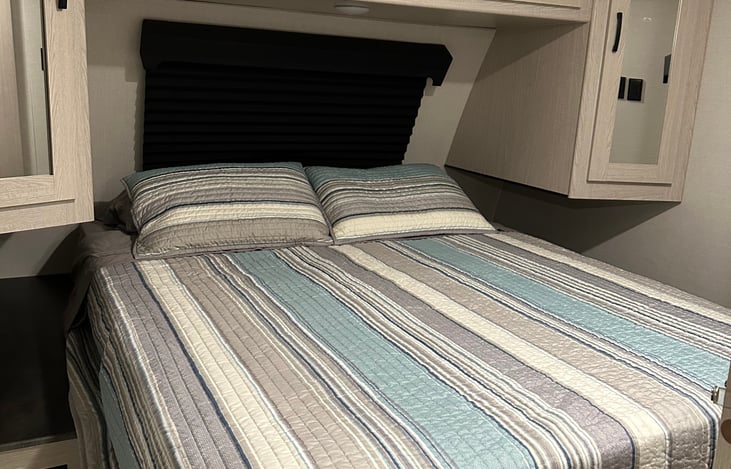 Queen Size Bed with Quality residential mattress. (Not the camper mattress it came with)