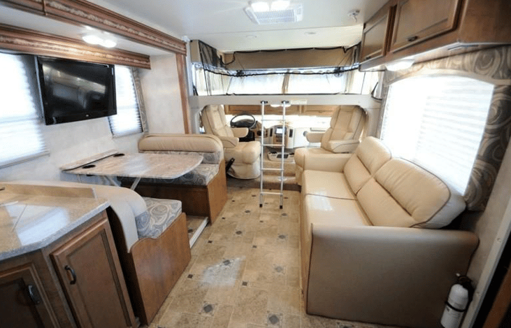 Dinette, sleeper sofa and loft bed