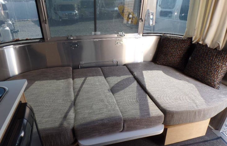 Front dining table converts to second bed