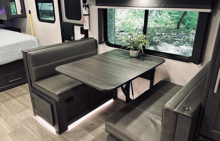 Dinette (no knee knockers!), which can easily convert to a bed (bedding provided).