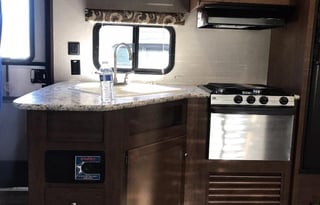 2018 Keystone Hideout, 26' long plus 3' hitch. Total: 29 Feet long.