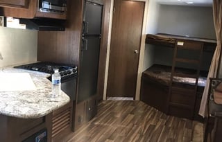 2018 Keystone Hideout, 26' long plus 3' hitch. Total: 29 Feet long.