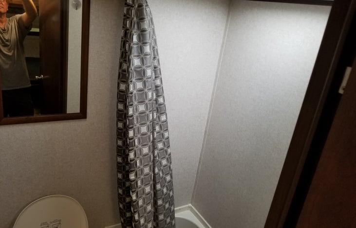 Full tub Shower in bathroom