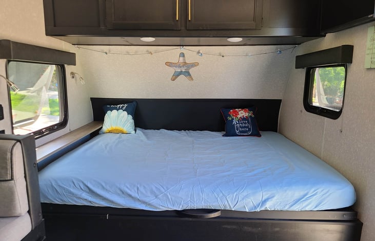 Queen size bed, blankets and pillows are offered for a fee. Or you can bring your own!