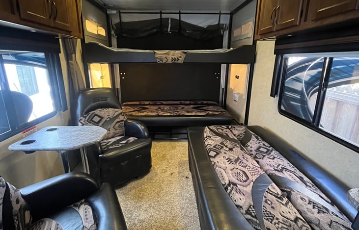 living space with three bed configuration