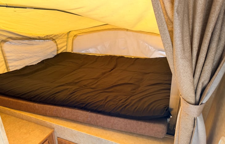 Front pop out bed