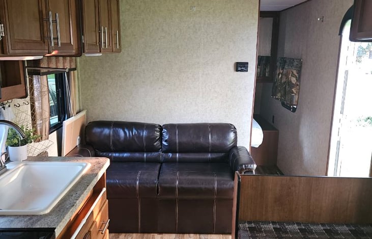 Leather couch (comfortable on rainy days).  The couch also folds down into a bed (no picture).