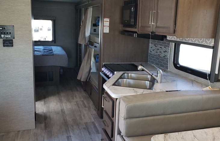Kitchen looking back to Bedroom