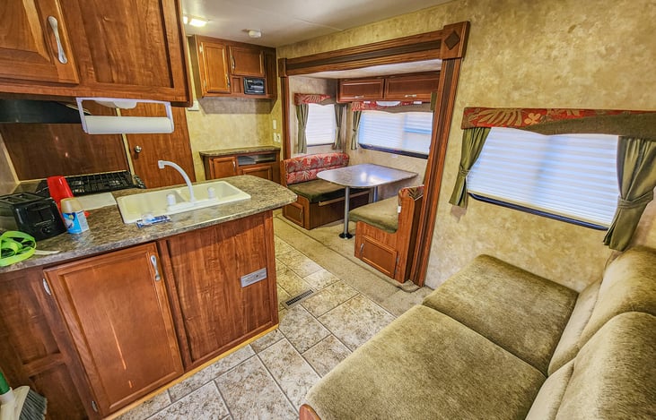 Spacious kitchen/lounging area with dinette in slide.