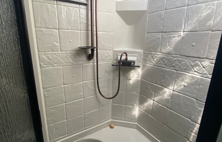 Full shower with daylight Window above