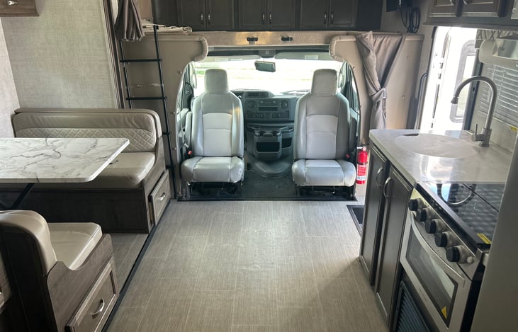 Front with Cab seats rotated for additional sitting