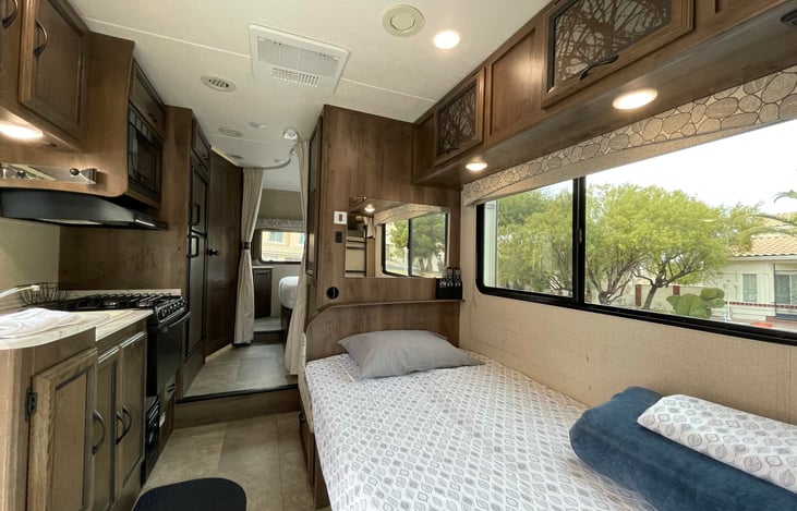 Convertible pedestal dinette bed. Bedding available as an add-on.