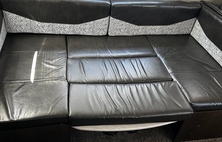 Dinette converts into a bed.