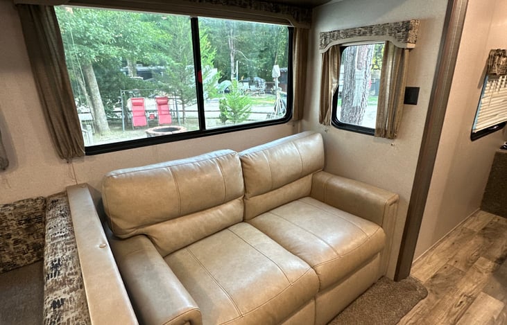 Leather loveseat with full size pull out bed.